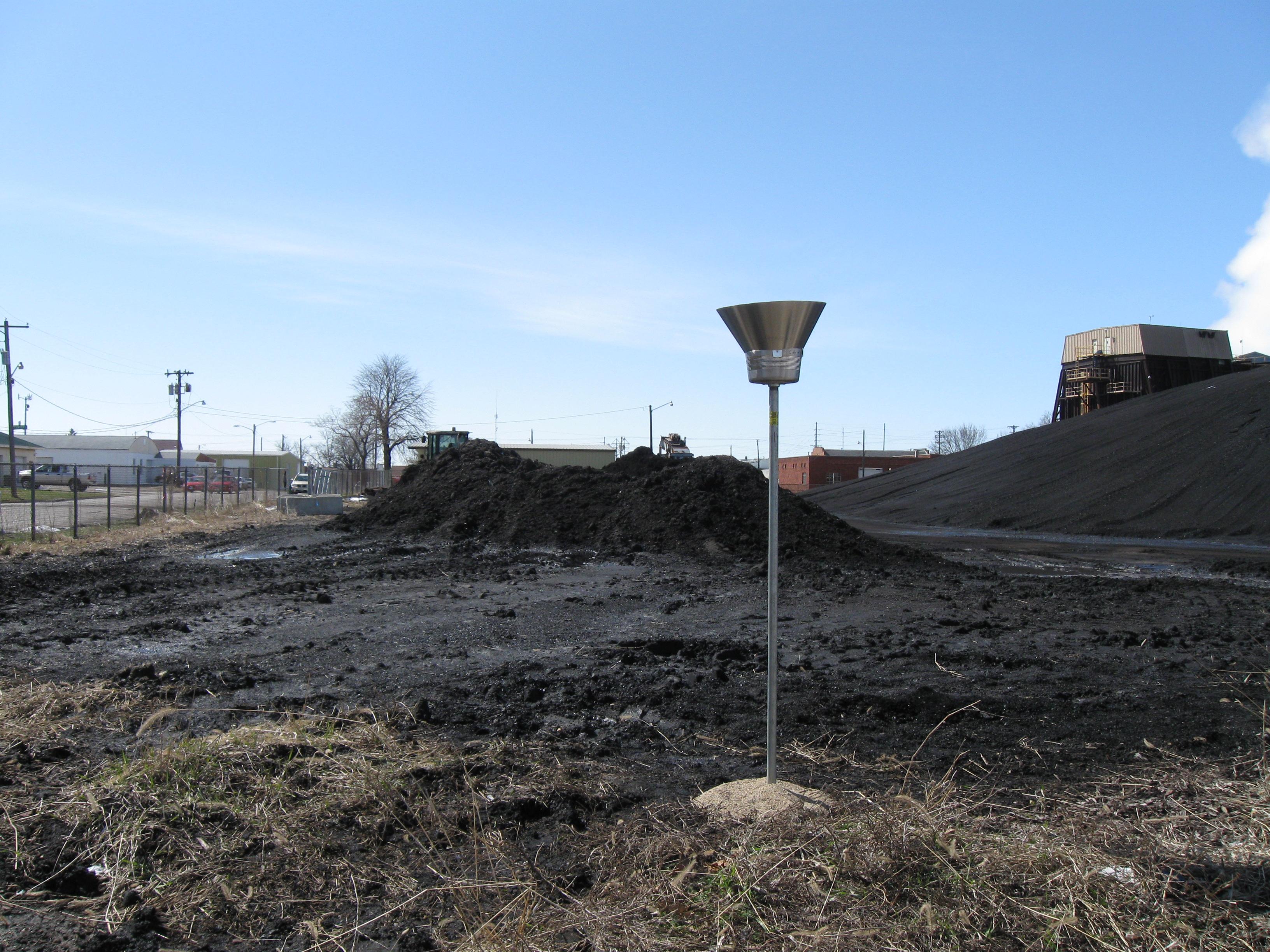 Fugitive dust monitoring station installed at an industrial facility